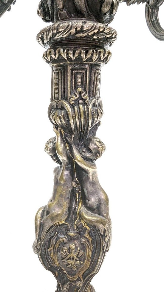Pair Of Silver Bronze Candlesticks With Nineteenth Cherubs