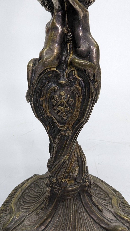 Pair Of Silver Bronze Candlesticks With Nineteenth Cherubs