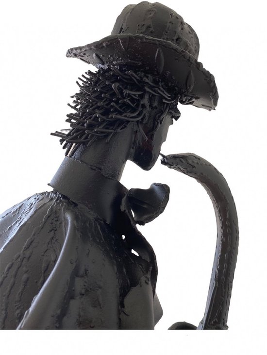 Iron Sculptures Of The Artist Jean Alexandre Delattre The Man With Flowers And The Man With Saxo.