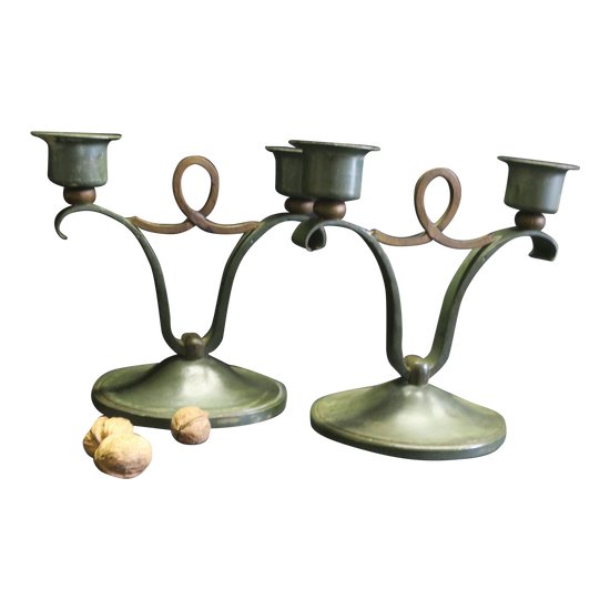 Pair of wrought iron design candle holders
