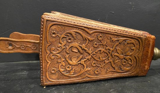 Carved wood bellows from the 18th century