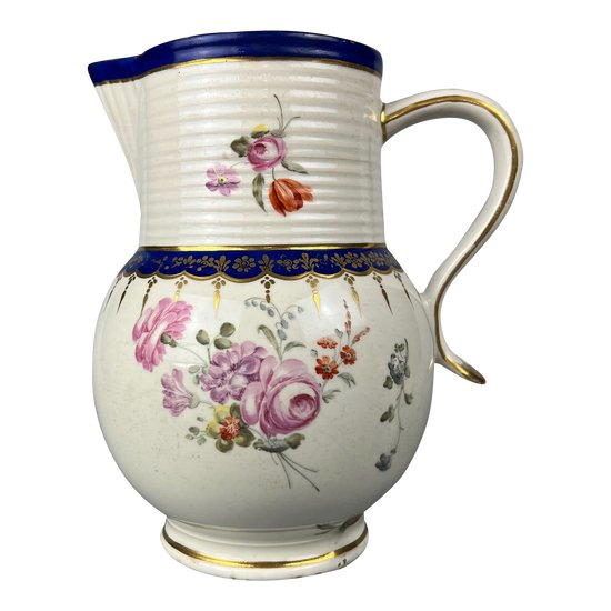 A late 18thc Derby jug hand painted in the manner of Edward Withers c.1775-80