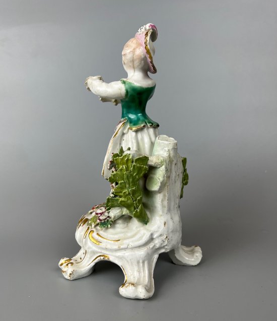 A mid 18thc Bow "New Dancers" figure on a rococo footed base 1756-65
