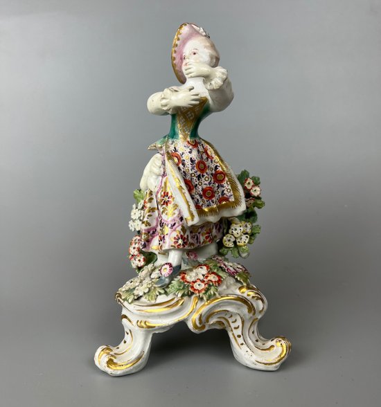 A mid 18thc Bow "New Dancers" figure on a rococo footed base 1756-65