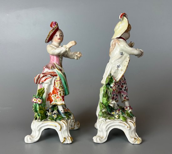 A fine pair of 18thc Bow "New Dancers" figures on rococo footed bases. 1756-65