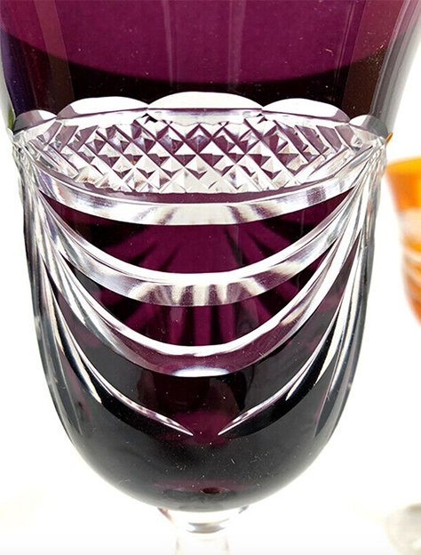 Set of five colored cut crystal stemware