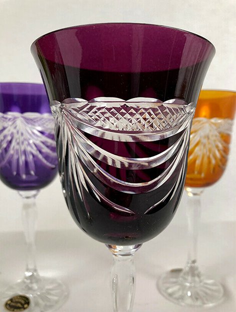 Set of five colored cut crystal stemware
