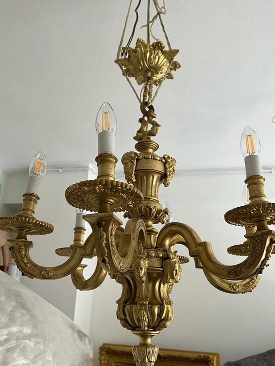 Gilded Bronze Chandelier of Renaissance style XIXth century decorated with heads of Mascaron