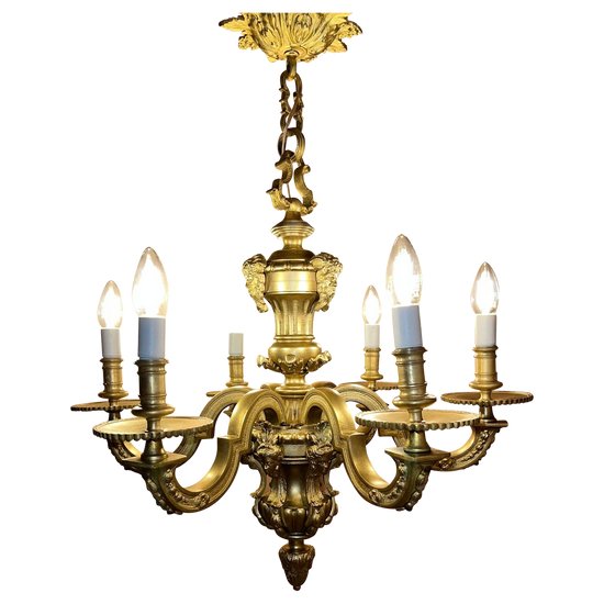 Lustre En Bronze Doré de style renaissance XIXème décor têtes de Mascaron