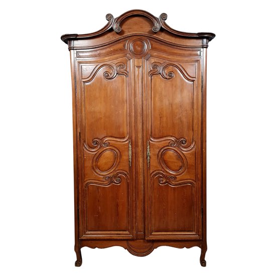 Louis XV period Cauchoise cabinet with gendarme hat in solid pine around 1750