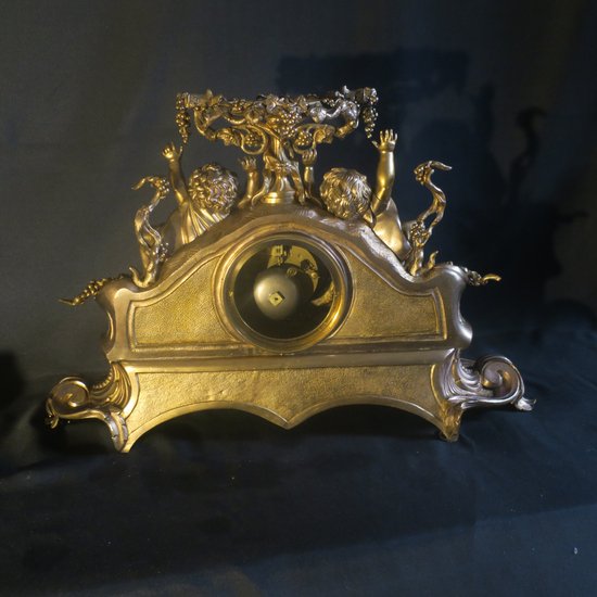 Importante pendule rocaille en bronze, XIX° siècle