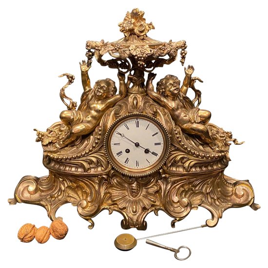 Importante pendule rocaille en bronze, XIX° siècle