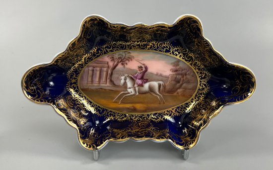A late 19thc. Royal Vienna spoon tray, finely painted with an equestrian scene.