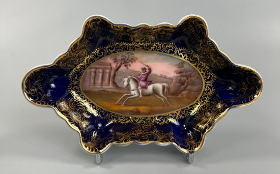 A late 19thc. Royal Vienna spoon tray, finely painted with an equestrian scene.