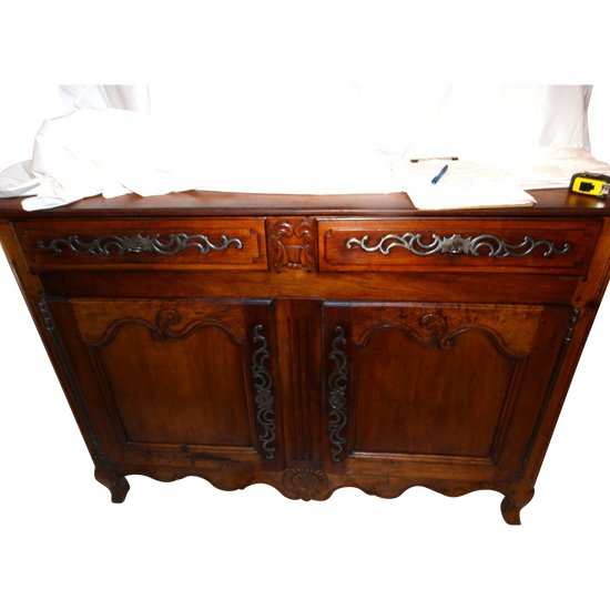 Sideboard with 2 drawers and 2 doors in molded walnut. Provencal work XVIIIth century