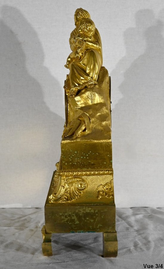 Pendule en Bronze Doré « La Vierge à la Chaise » - 1ère partie XIXe