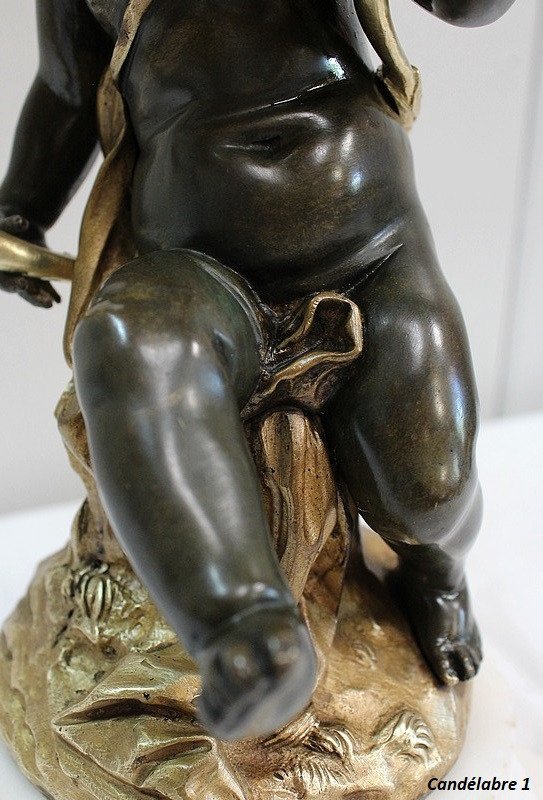Coppia di candelabri in bronzo "Un Amour et un Faune", da Clodion e Delarue - Fine XIX secolo