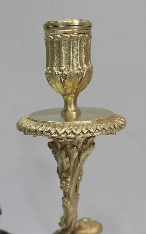 Coppia di candelabri in bronzo "Un Amour et un Faune", da Clodion e Delarue - Fine XIX secolo
