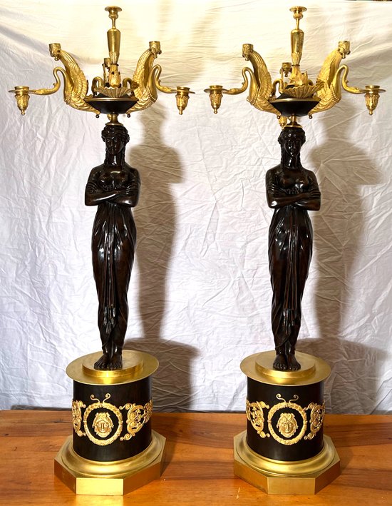 Pair of very important candelabra of Empire period in patina and gilt bronze