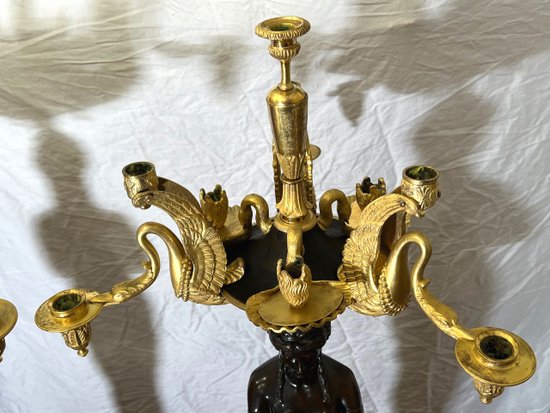 Pair of very important candelabra of Empire period in patina and gilt bronze