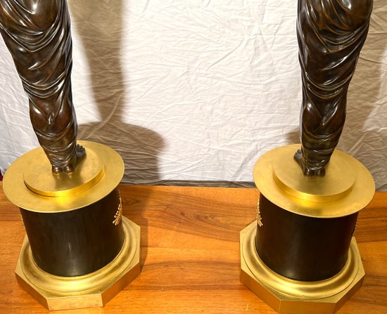 Pair of very important candelabra of Empire period in patina and gilt bronze