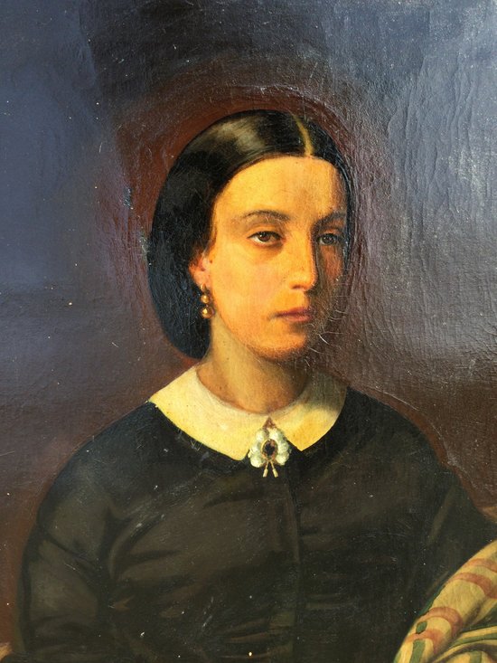 Porträt einer Frau mit einem Buch.1860