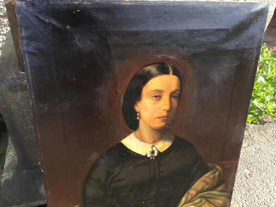 Porträt einer Frau mit einem Buch.1860