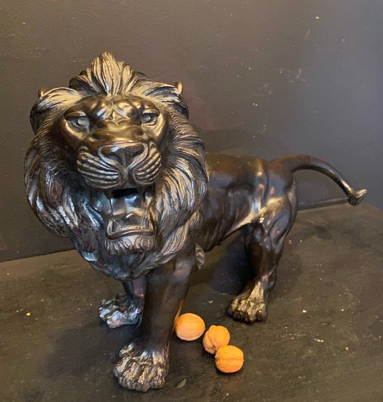 bronze walking lion