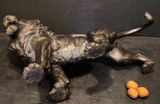 bronze walking lion