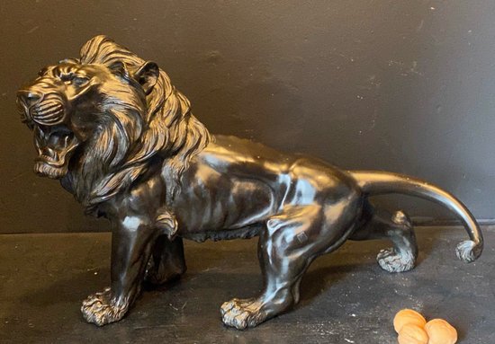 bronze walking lion