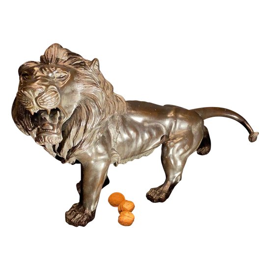 bronze walking lion