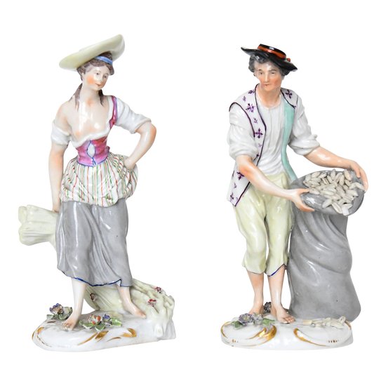 Pair of porcelain statuettes of Samson representing a couple of peasants