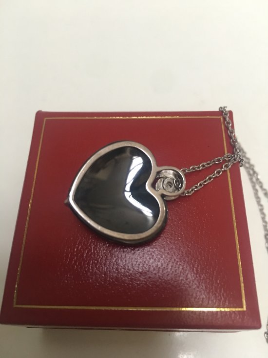 Ciondolo in argento con ematite tagliata e diamante