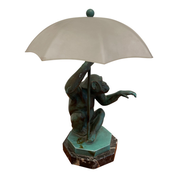 Le Verrier - Lampe, die einen Affen unter einem Regenschirm darstellt