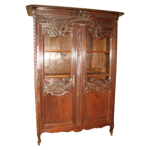 Armoire de mariage vitrée et sculptée en chêne époque 19ème Origine Normandie