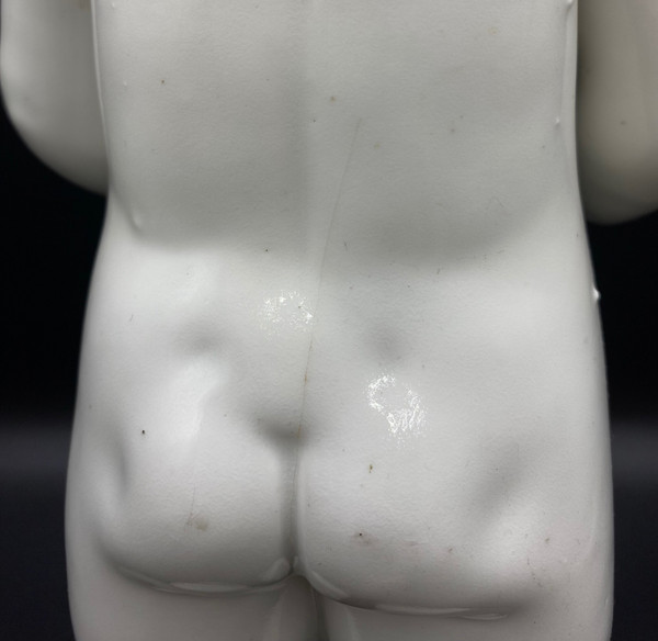 CHILD IN FOOT PORCELAIN