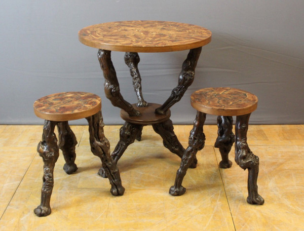 Pedestal table and its stools brutalist in vine stock around 1950