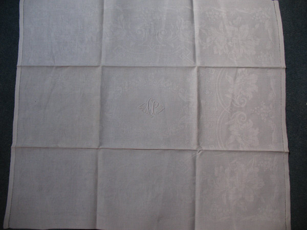 11 damask napkins decorated with iris and lily of the valley embroidered initials LP