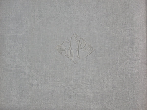 11 damask napkins decorated with iris and lily of the valley embroidered initials LP