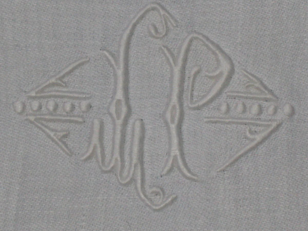 11 damask napkins decorated with iris and lily of the valley embroidered initials LP