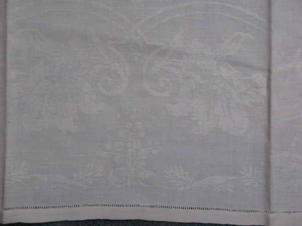 11 damask napkins decorated with iris and lily of the valley embroidered initials LP