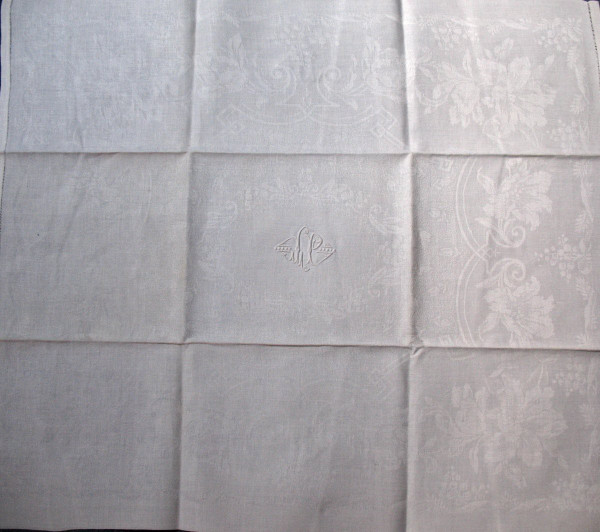 11 damask napkins decorated with iris and lily of the valley embroidered initials LP