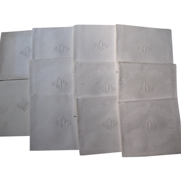 11 damask napkins decorated with iris and lily of the valley embroidered initials LP
