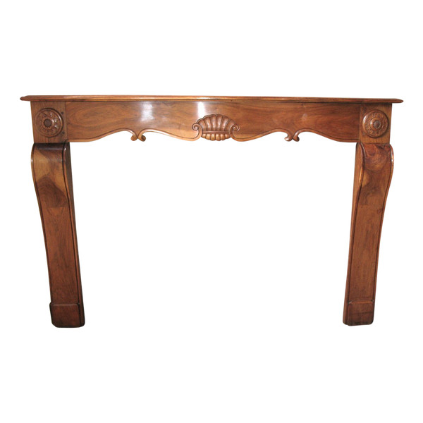 Crossbow-shaped fireplace and curved legs in walnut, Art Deco period