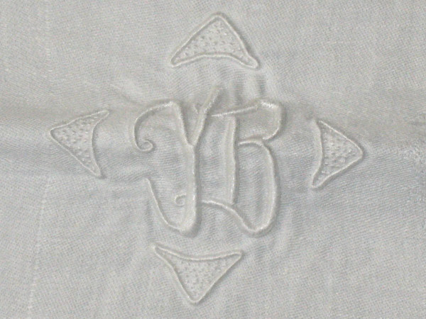 10 damask napkins decorated with garlands of roses initials YB early 20th century