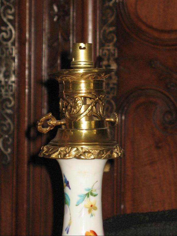 Pair of large lamps in Paris porcelain and gilded bronze, 19th century