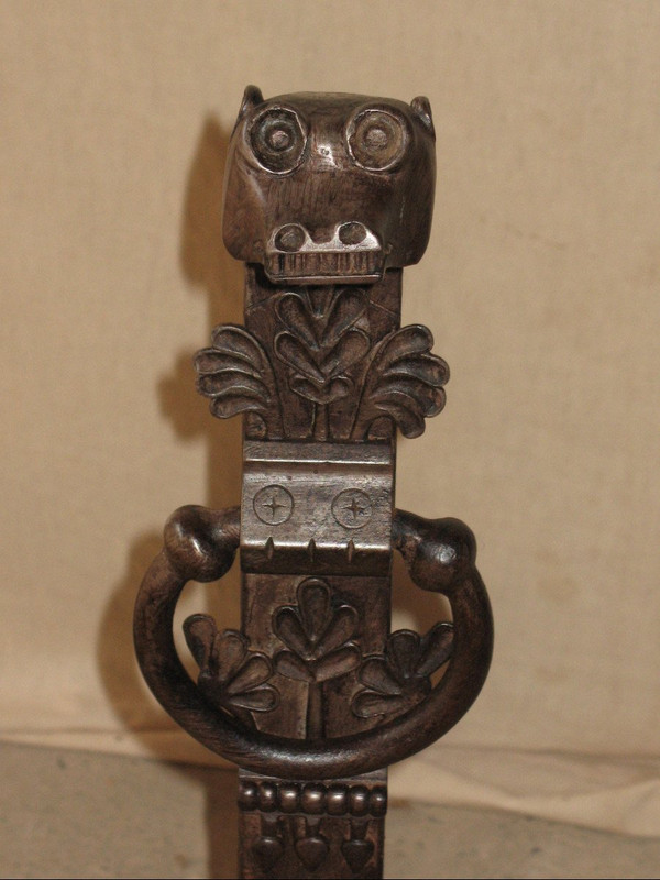 Pair of fireplace landier andirons decorated with fantastic animals, 20th century