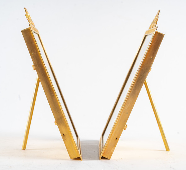 A pair of late 19th century gilt bronze photo frames