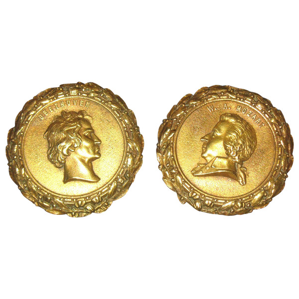 Pair of Louis XVI style bronze medallions with the effigy of Mozart and Beethoven, 19th century