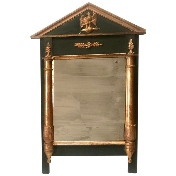 Miroir en bois doré et teinté de style Empire XIXème 